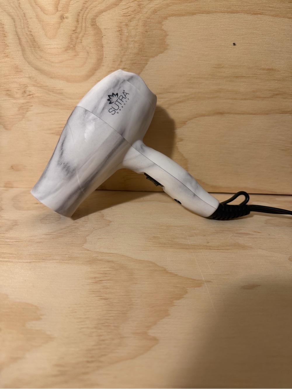 SUTRA Marble-Pattern Hair Dryer in White and Black Accents dual volt